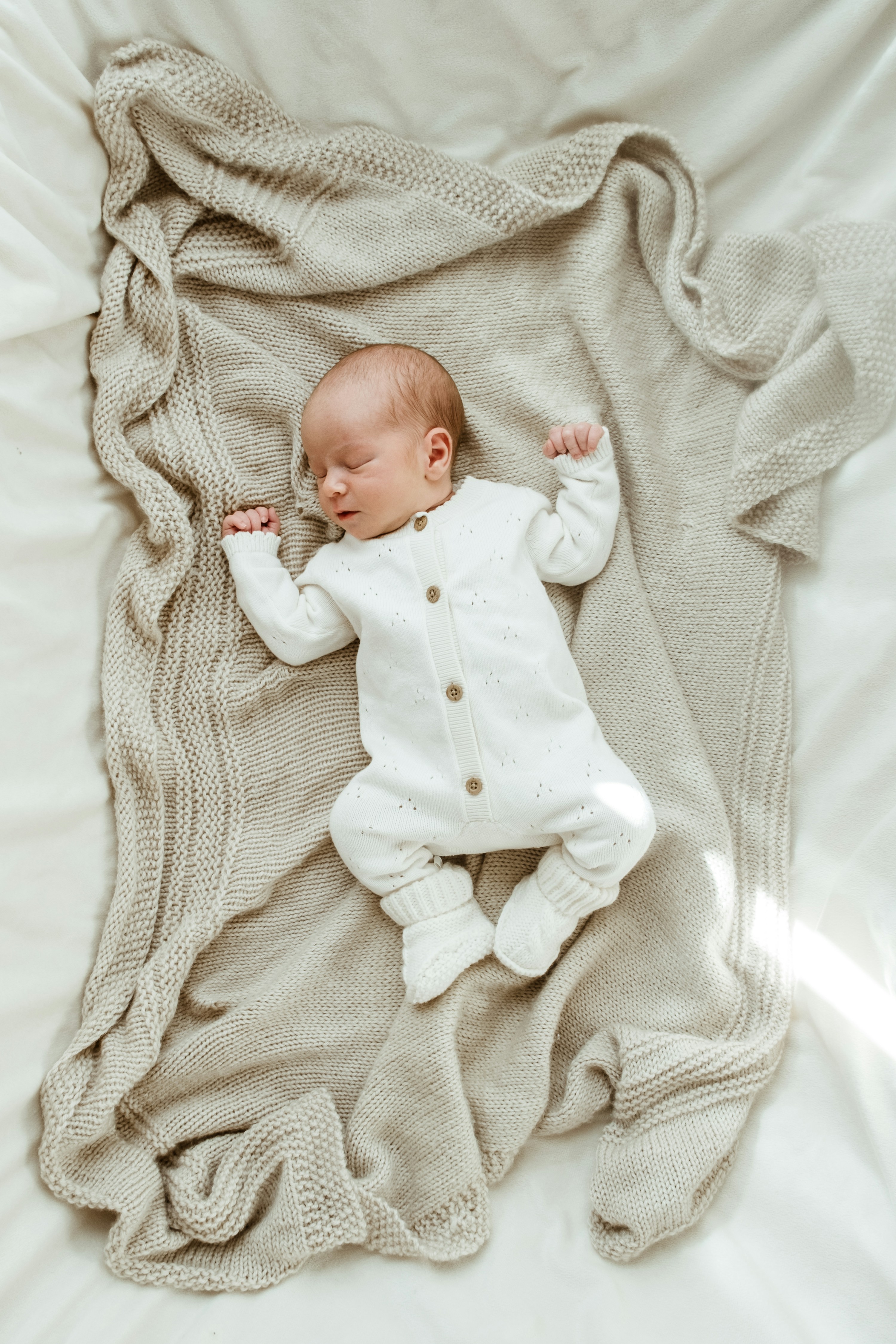 Sleeping newborn during a quiet photography session